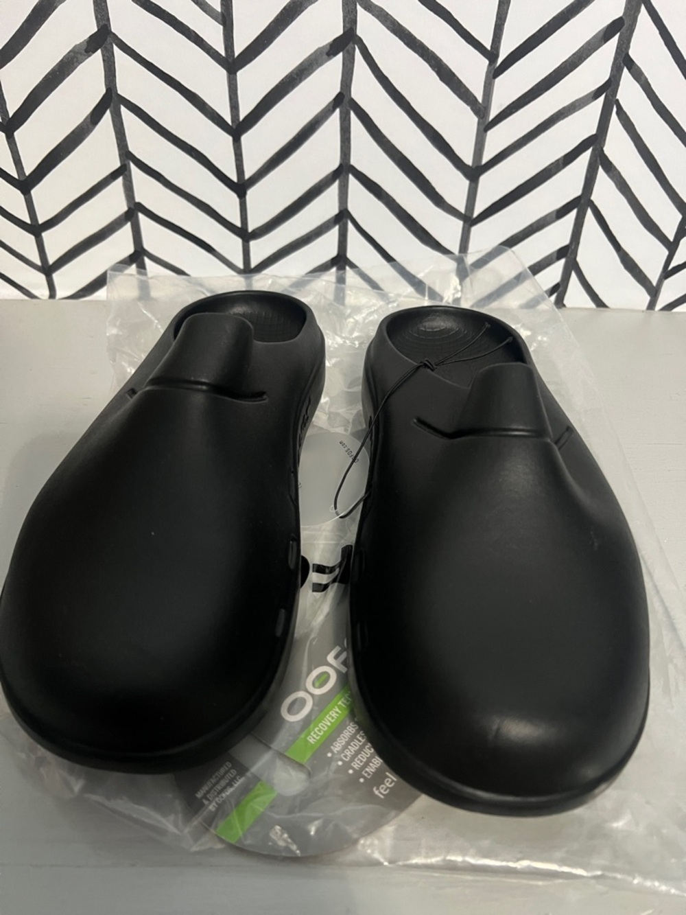 OOFOS Black Closed-Toe Slip-On Clogs